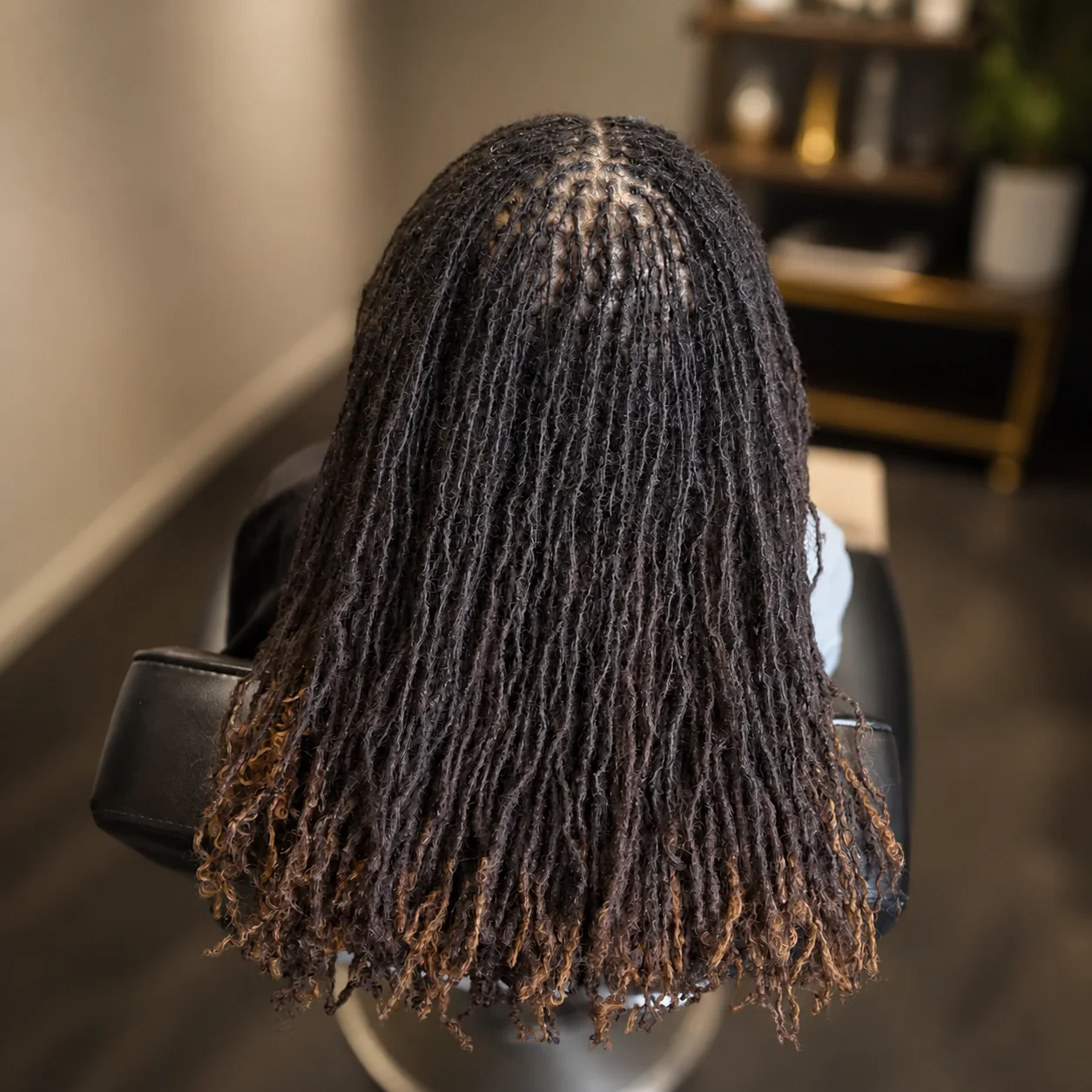 Shoulder-length loc maintenance by Taé